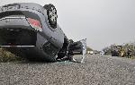 Автомобил катастрофира в трактор и се обърна по таван край хасковско село
